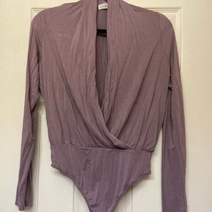 Womens size Medium lavender body suit
